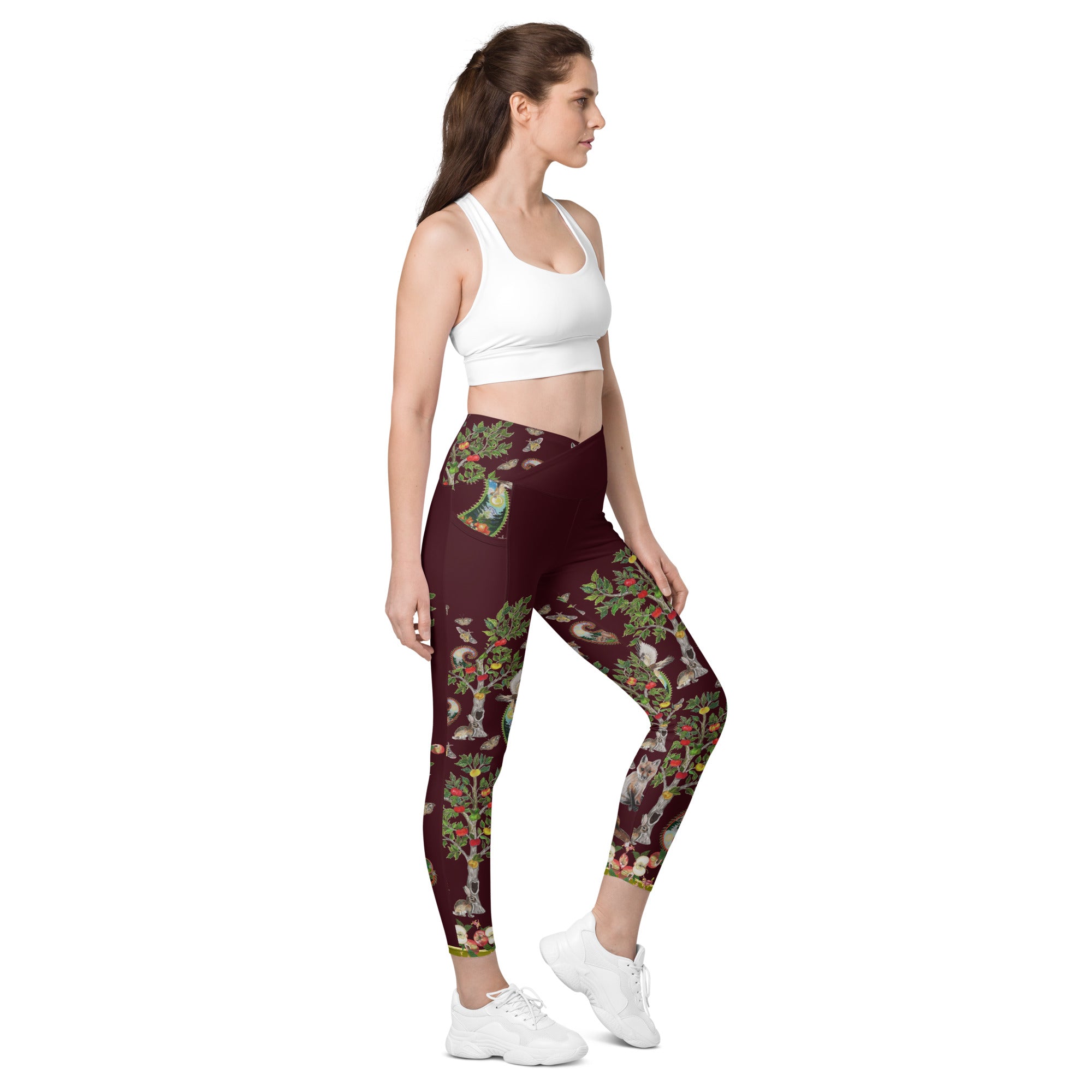 https://www.magicalyogiwear.com/cdn/shop/files/all-over-print-crossover-leggings-with-pockets-white-right-front-654ff8e579fd7_2000x.jpg?v=1699739904